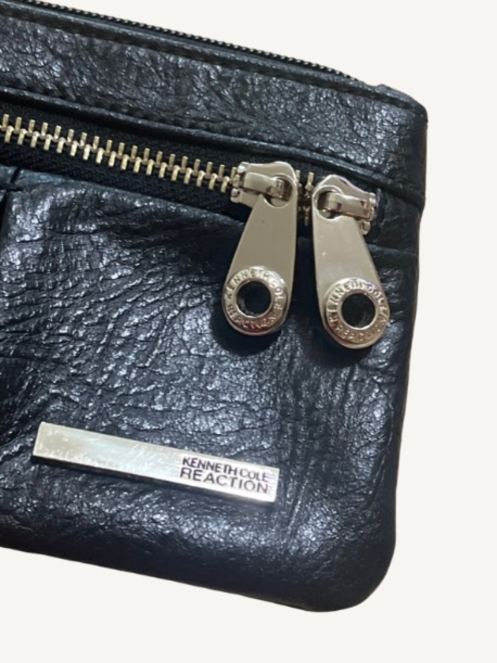 Kenneth Cole Reaction Black
Pebbled Leather Pouch Wallet with Gold-Tone Hardware